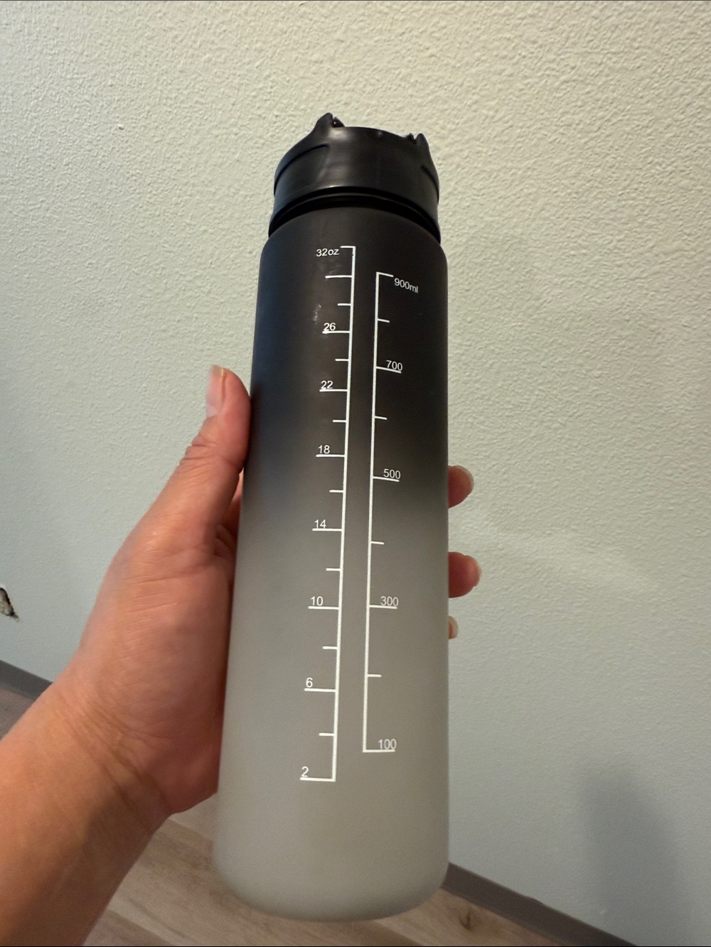 Water bottle with plastic material